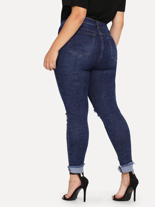 Shredded plus size women's jeans