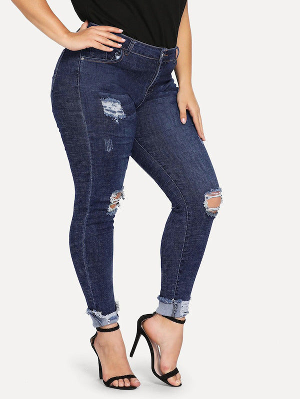 Shredded plus size women's jeans